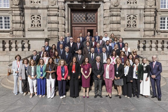 De deelnemers aan de conferentie in Kopenhagen